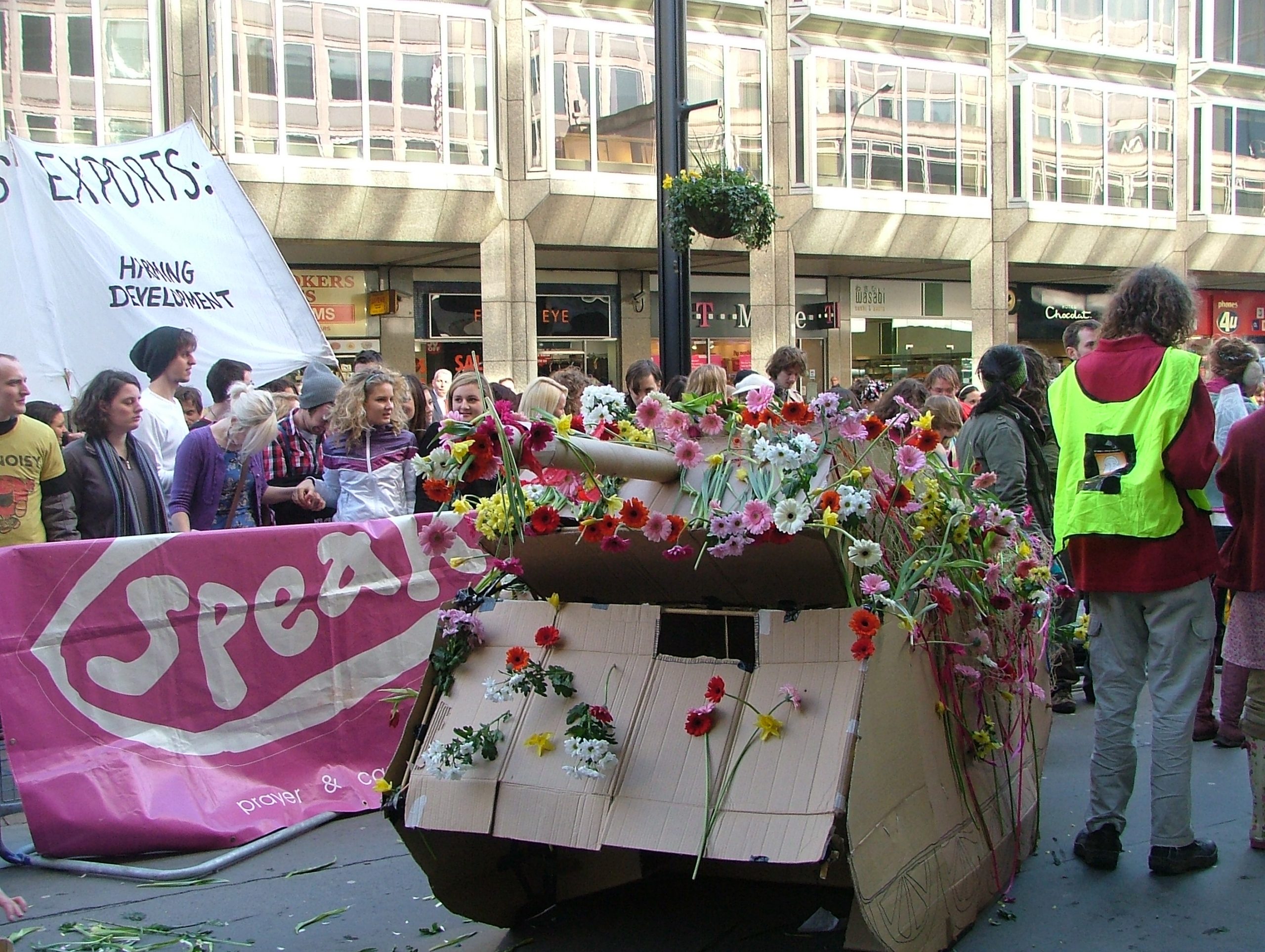 The cardboard tank, covered with flowers