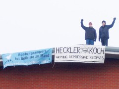 Anti-arms trade protesters on H&amp;K rooftop
