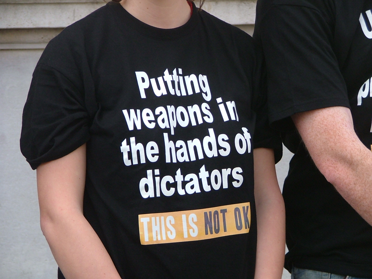 This is not OK - teeshirt of petitioner at Downing Street, 9 March 2011