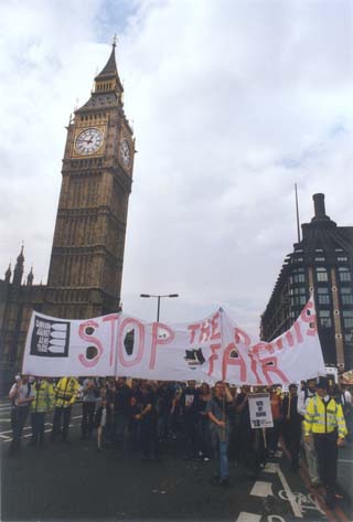 Anti-arms fair protesters outside parliament, 2003