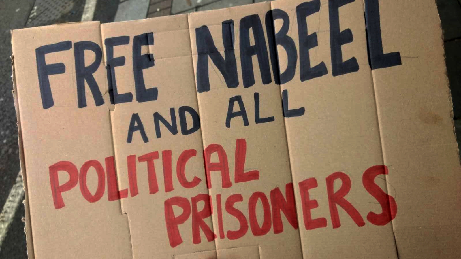 Placard that reads &quot;Free Nabeel and all political prisoners&quot;