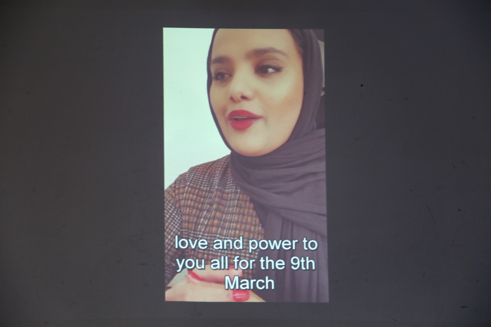 Pic of Amina Atiq giving a video message