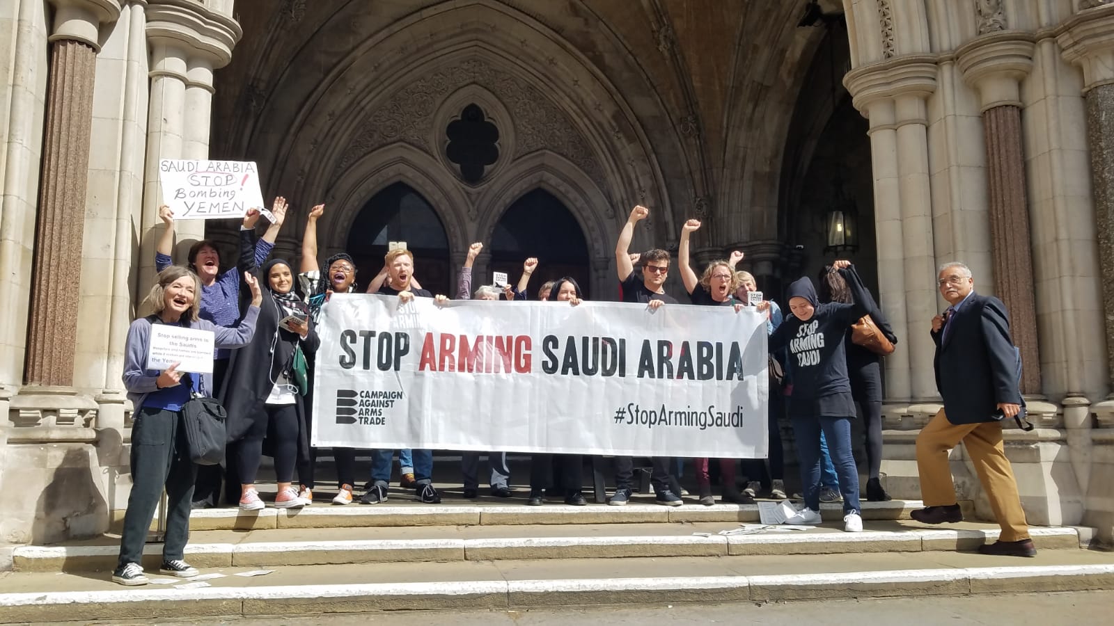 Activists celebrate the Court judgment ruling arms sales to Saudi unlawful