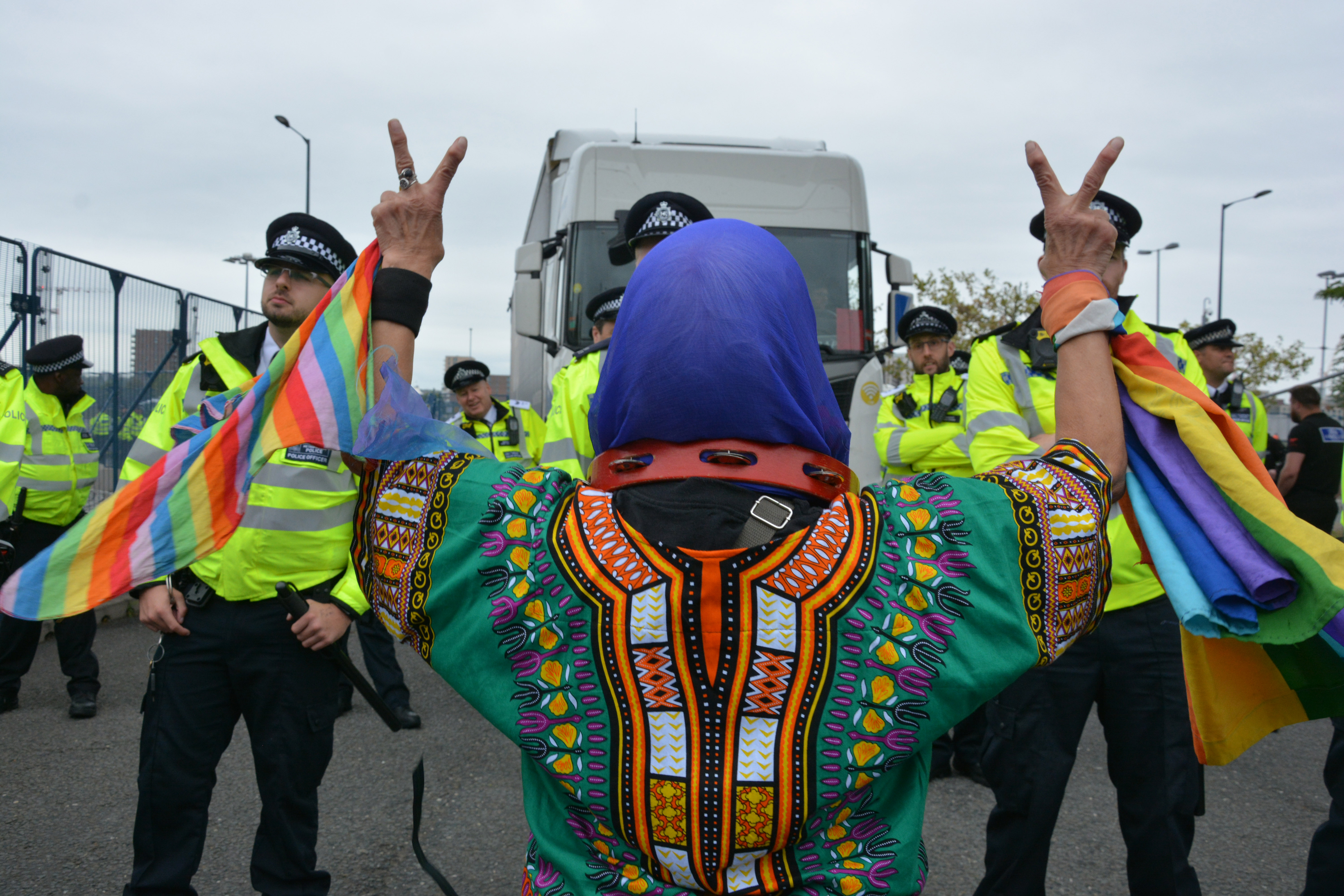 Protester blocks road outside DSEI