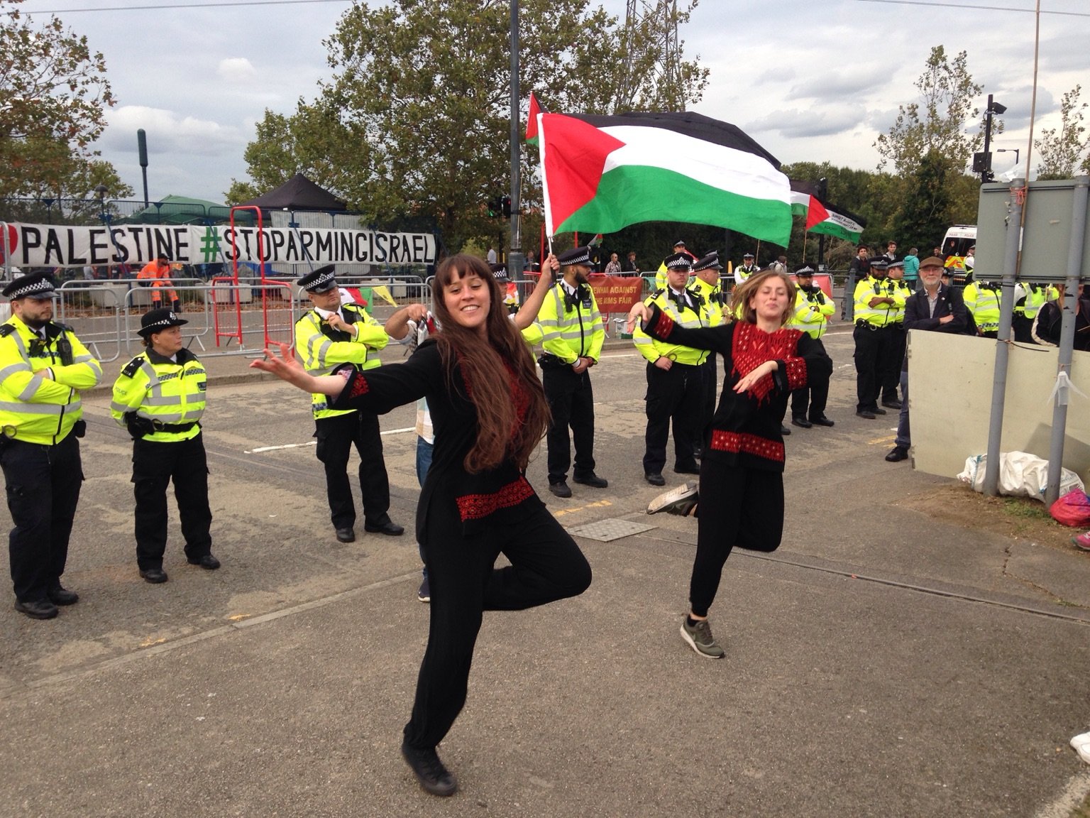 Dabka dancing protesters outside DSEI