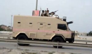 Armoured vehicle driving on a motorway