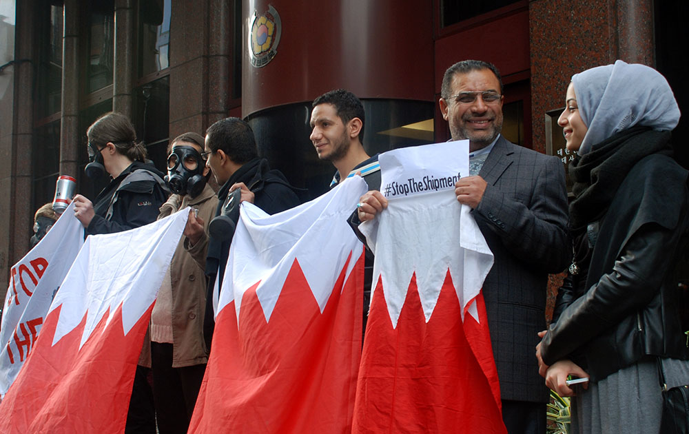 &quot;Protesters holding the flag of Bahrain outside the South Korean embassy in London