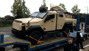 armoured vehicle on a flat-bed truck