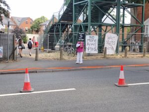 Campaigners leaflet and protest arrivals to Farnborough Arms Fair