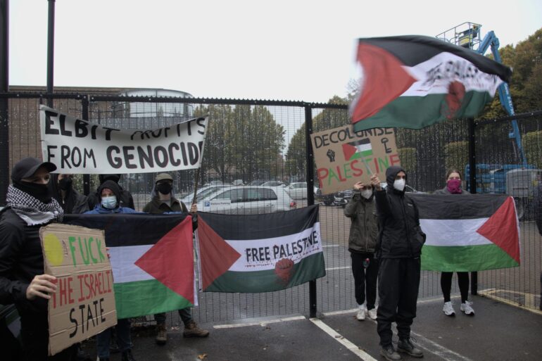 Protesters with banners outside Elbit in Bristol.