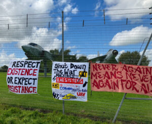 Banners attached to BAE Systems security fence.