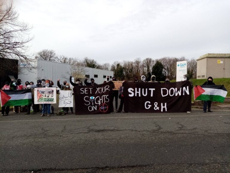 Campaigners blockade Gooch and HouseGo in Plymouth with banners reading Stop G&H and Palestinian flags