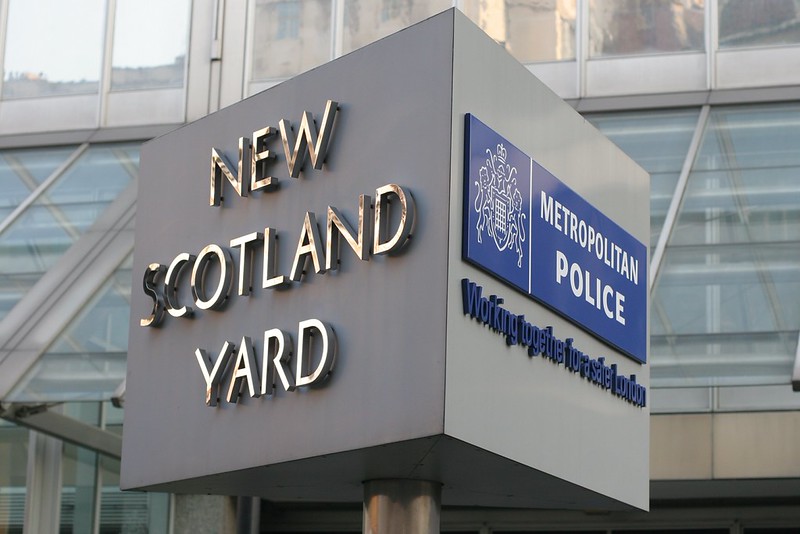 Image is of the New Scotland Yard/Met Police sign